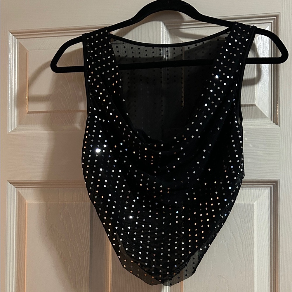 Never used see thru triangle shape shirt